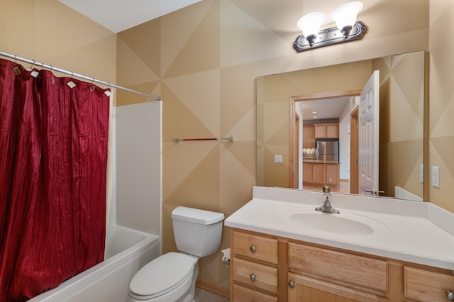 full bathroom featuring toilet, shower / bath combo with shower curtain, and vanity