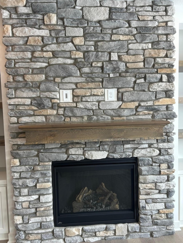 room details with a stone fireplace