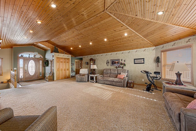 living room featuring lofted ceiling, carpet flooring, and wooden ceiling