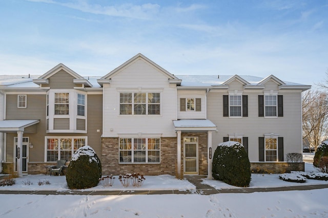 view of front of house featuring brick siding