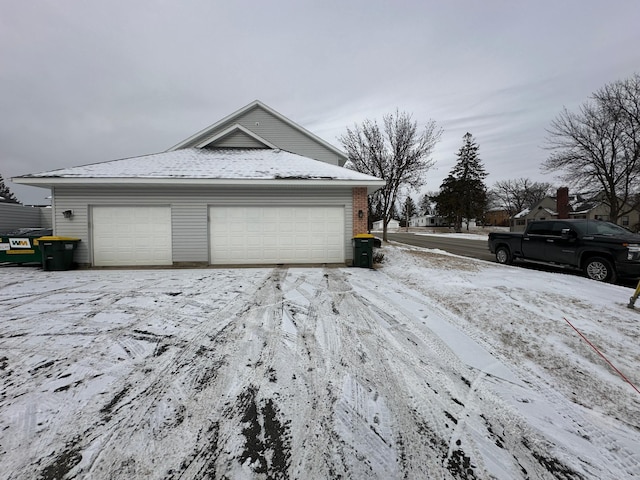 view of snow covered property