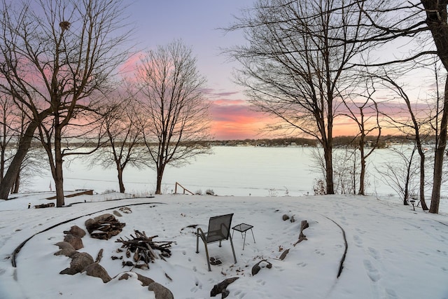view of yard layered in snow