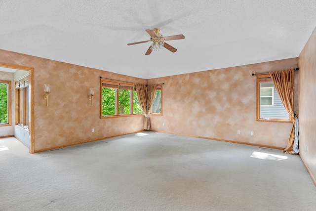 16091 Northwood Rd NW, Prior Lake, MN 55372 - spare room with a ceiling fan, carpet floors, and a textured ceiling