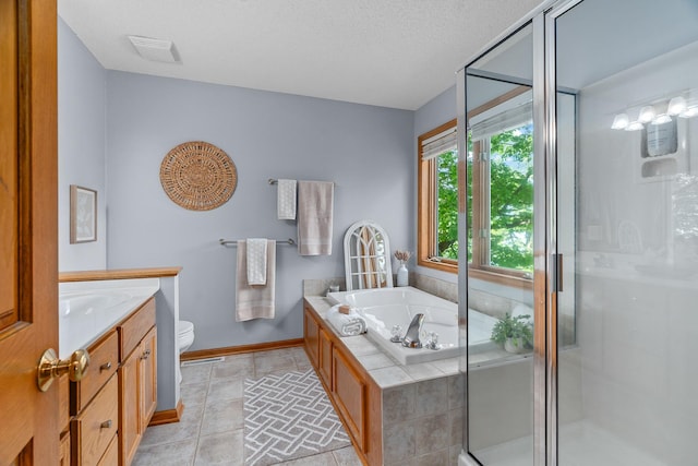 16091 Northwood Rd NW, Prior Lake, MN 55372 - bathroom with vanity, a bath, a stall shower, and tile patterned flooring