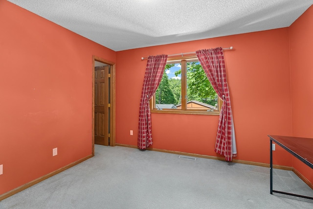 16091 Northwood Rd NW, Prior Lake, MN 55372 - carpeted spare room featuring a textured ceiling and baseboards