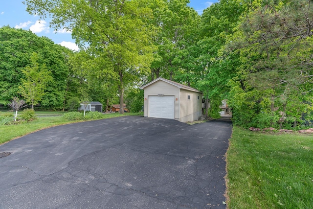 16091 Northwood Rd NW, Prior Lake, MN 55372 - detached garage featuring asphalt driveway