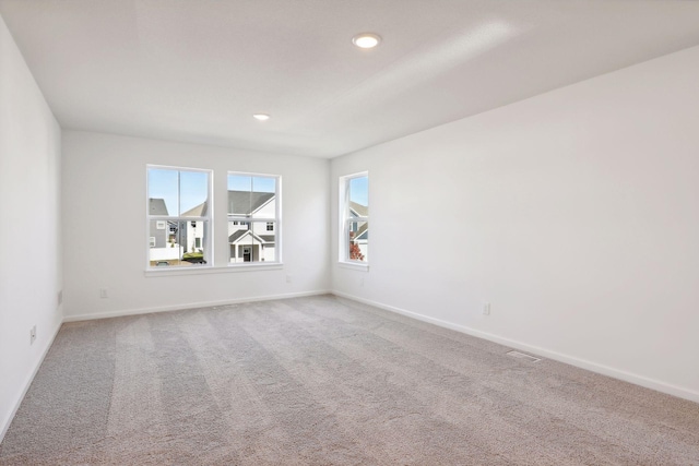 empty room featuring carpet floors