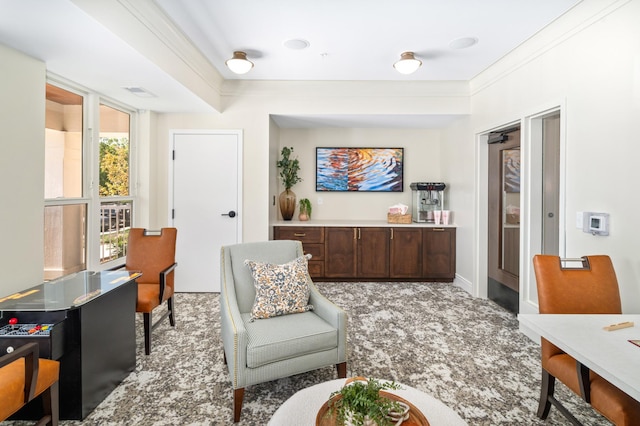 living area featuring light carpet and crown molding