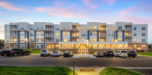 view of outdoor building at dusk