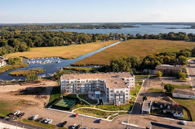 birds eye view of property with a water view