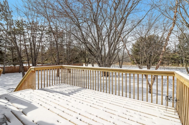 view of snow covered deck