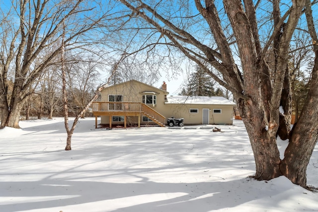 view of front of house with a wooden deck