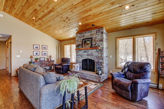 living room featuring a stone fireplace, a baseboard radiator, wood ceiling, and hardwood / wood-style flooring