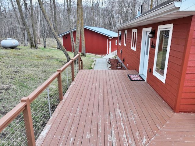 deck featuring a lawn