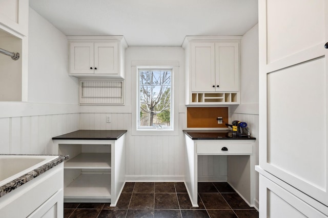 2650 Fox St, Orono, MN 55391 - kitchen with open shelves, white cabinetry, wainscoting, and baseboards