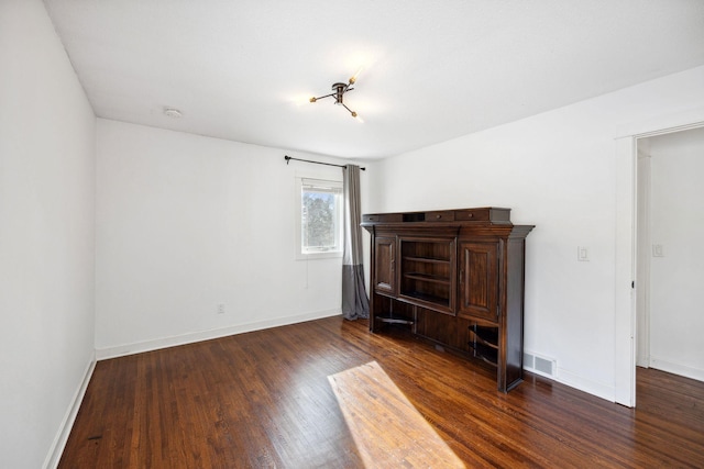 2650 Fox St, Orono, MN 55391 - unfurnished living room featuring dark wood finished floors and baseboards