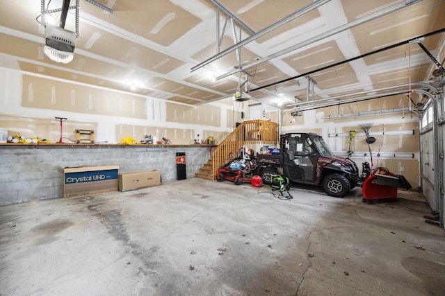 2650 Fox St, Orono, MN 55391 - garage featuring a garage door opener