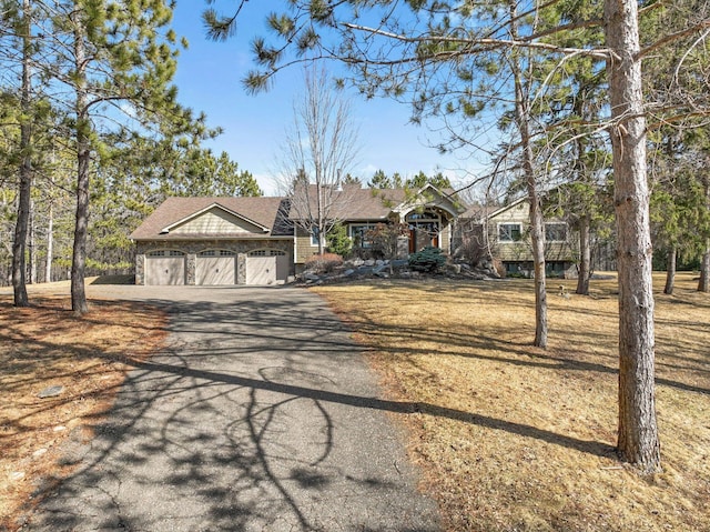 2650 Fox St, Orono, MN 55391 - view of front facade with driveway and a garage
