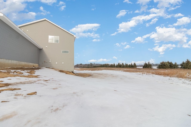 view of snow covered property