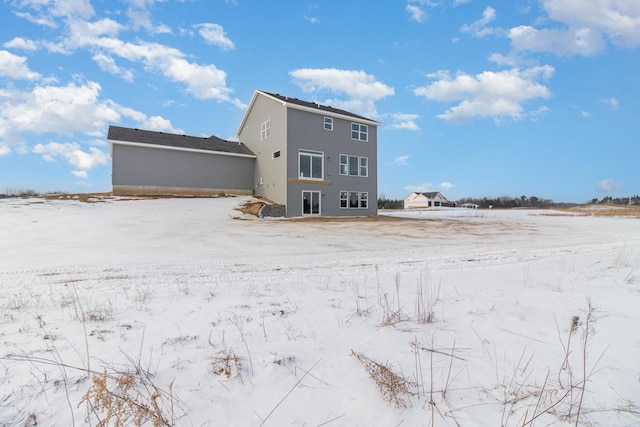 view of snow covered property