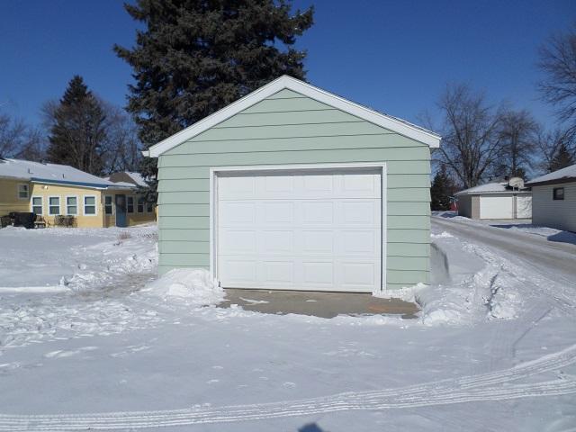 view of snow covered garage