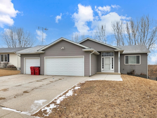 single story home with a garage