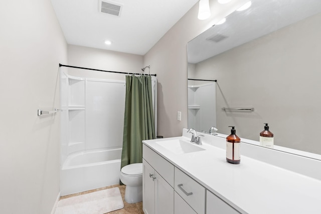 full bathroom featuring vanity, tile patterned floors, toilet, and shower / bath combo with shower curtain