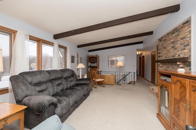 living room featuring beam ceiling and light colored carpet