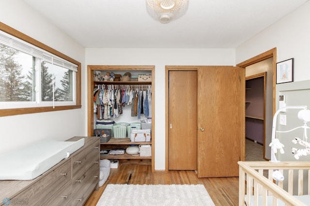 bedroom featuring light wood-type flooring