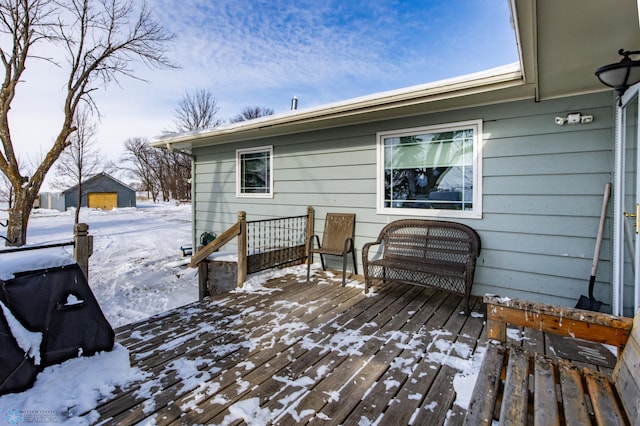 view of snow covered deck