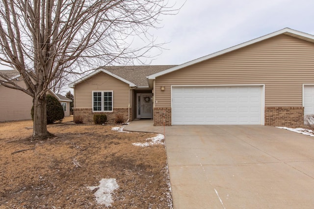 single story home featuring a garage