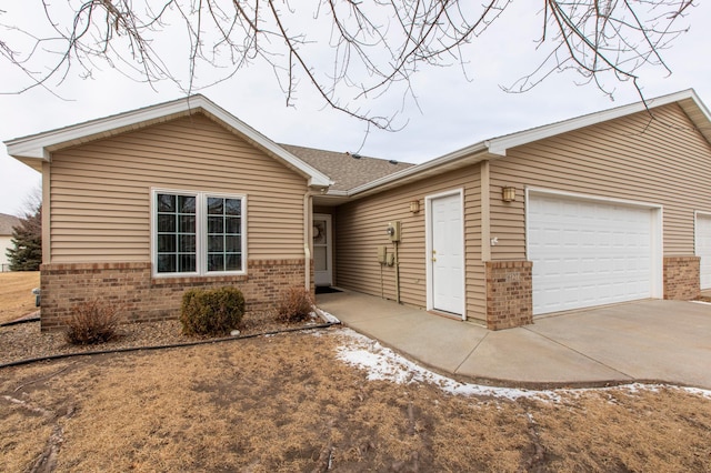 ranch-style home with a garage