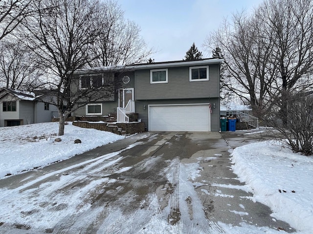 raised ranch featuring a garage