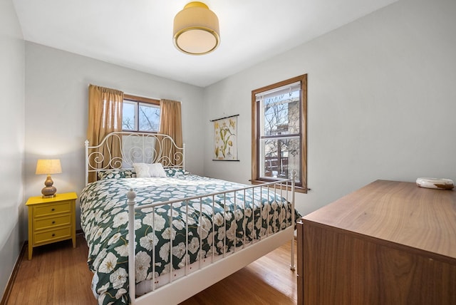 bedroom featuring hardwood / wood-style floors