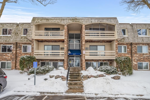 view of snow covered property