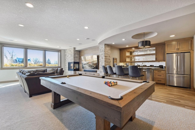 4765 Augusta St, Orono, MN 55364 - playroom featuring billiards table, a textured ceiling, recessed lighting, and light colored carpet