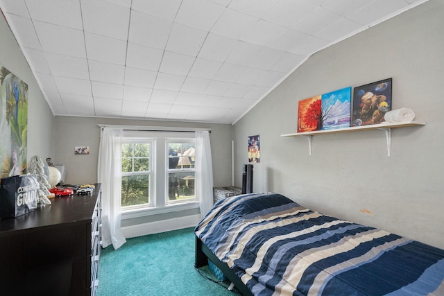 carpeted bedroom featuring vaulted ceiling