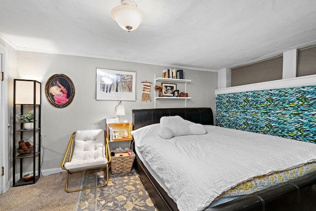 bedroom with baseboards, ornamental molding, and carpet flooring