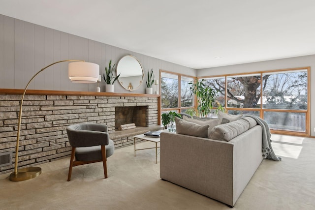 carpeted living room with a wealth of natural light