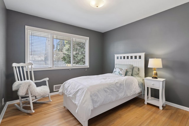 bedroom featuring light hardwood / wood-style floors