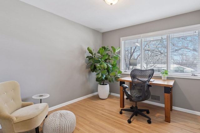 home office featuring light wood-type flooring