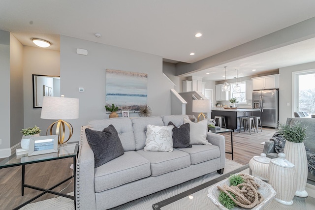 living room with light hardwood / wood-style floors