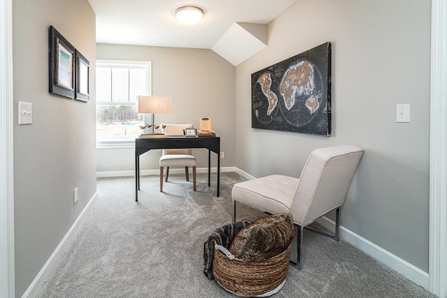 carpeted office space with lofted ceiling