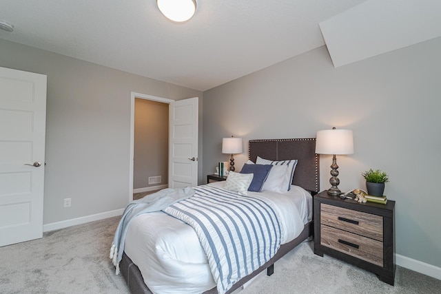 bedroom featuring light colored carpet