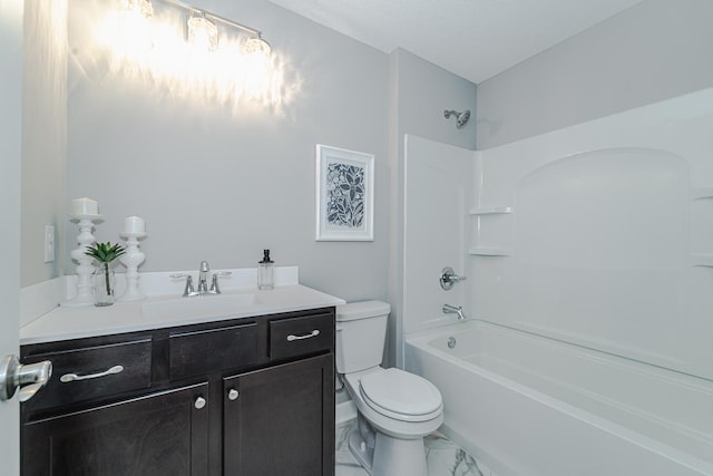 full bathroom featuring vanity, washtub / shower combination, and toilet