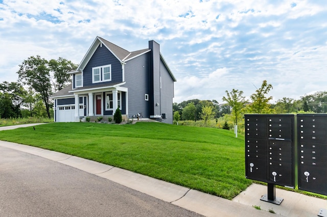 view of front of home featuring a garage and a front yard