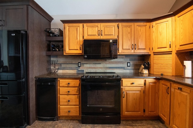 kitchen featuring tasteful backsplash and black appliances