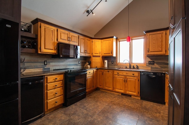 kitchen featuring sink, tasteful backsplash, vaulted ceiling, pendant lighting, and black appliances