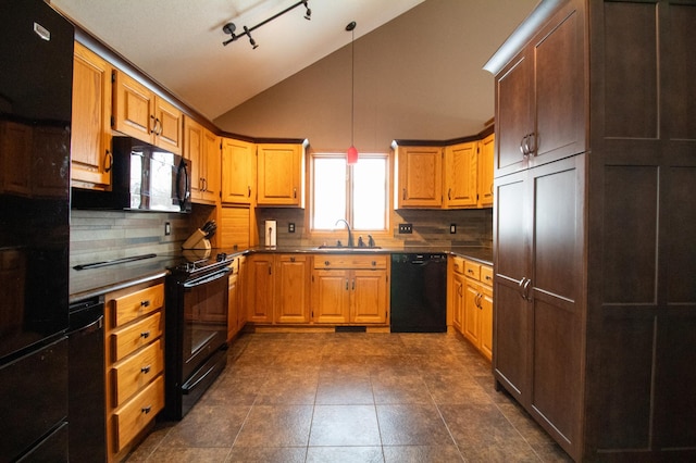 kitchen featuring lofted ceiling, sink, backsplash, black appliances, and decorative light fixtures