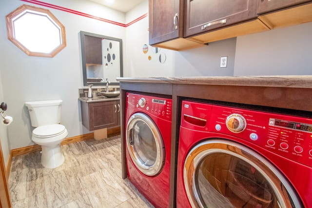 washroom featuring sink and washing machine and dryer